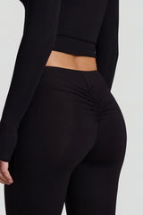 Modal Mid-Rise Flared Trousers in Black