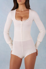 Knit Long-Sleeve Romper in Ivory