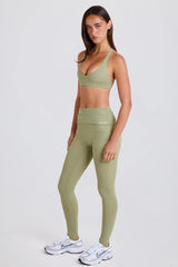 Four-Way Stretch Foldover Mid-Rise Stirrup Leggings in Matcha